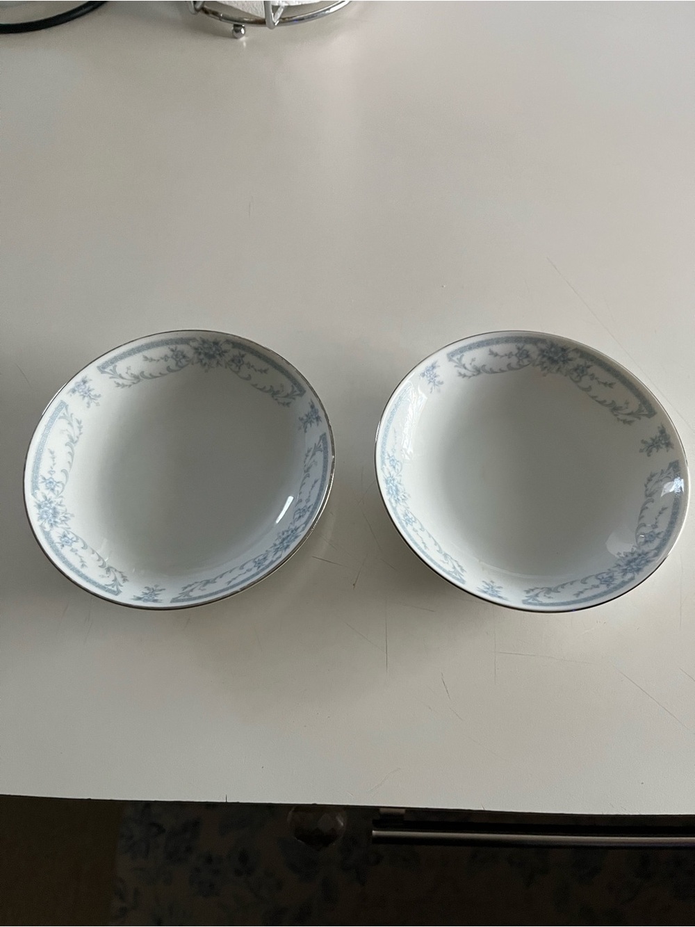 Set of 2 White Porcelain Bowls with Pale Blue Scroll Border